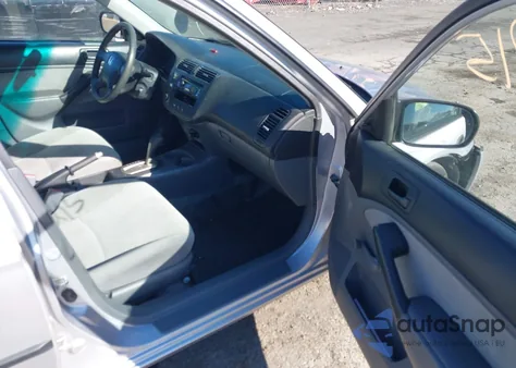 2001 Honda Civic Dx z USA, uszkodzony, nr VIN 1HGES16211L016384